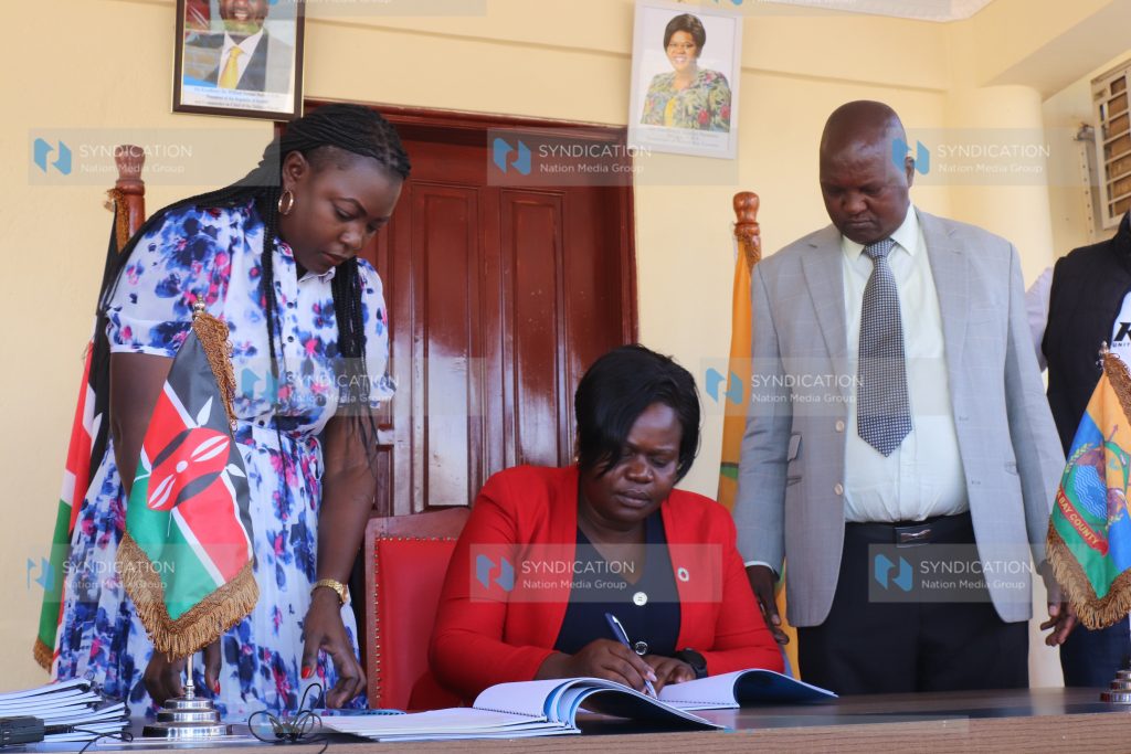 Homa Bay County Assembly Speaker Julius Gaya and Assembly Clerk Faith Apuko