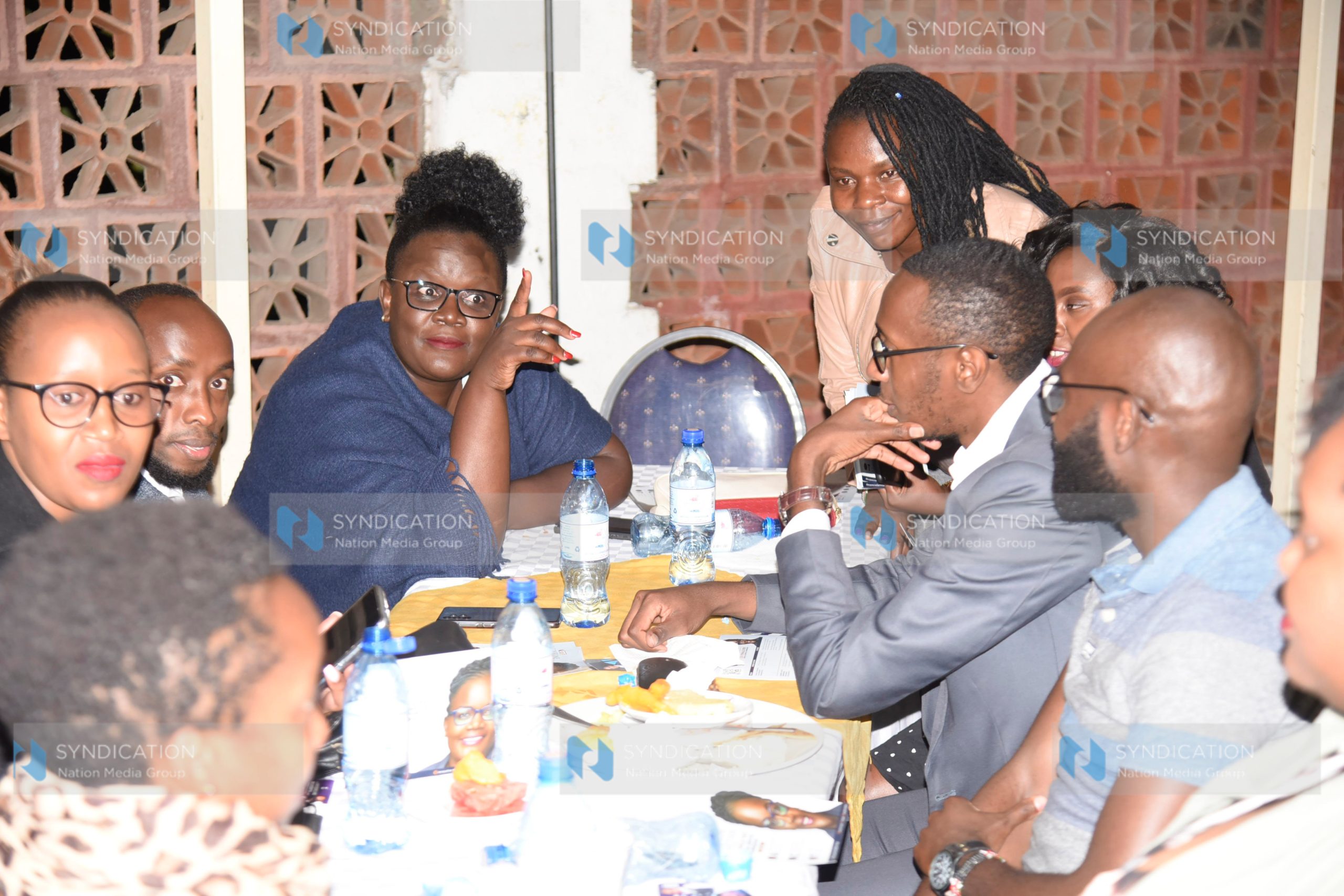 Lawyer Jacqueline Ingutiah, who is vying for LSK female representative, has a conversation with fellow lawyers