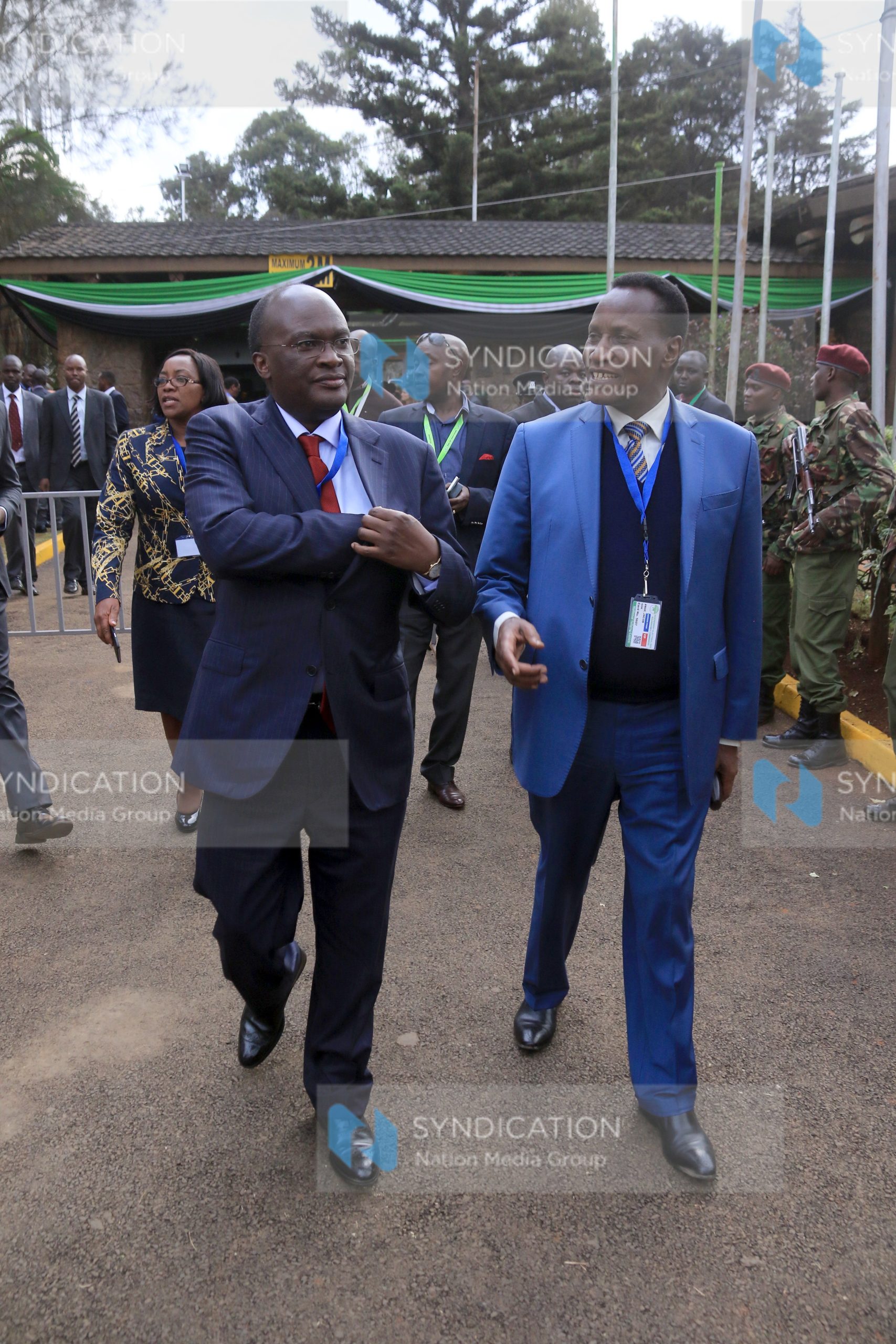 CS James Macharia (Transport) and CS Jacob Kaimenyi (Lands) are seen leaving Bomas of Kenya