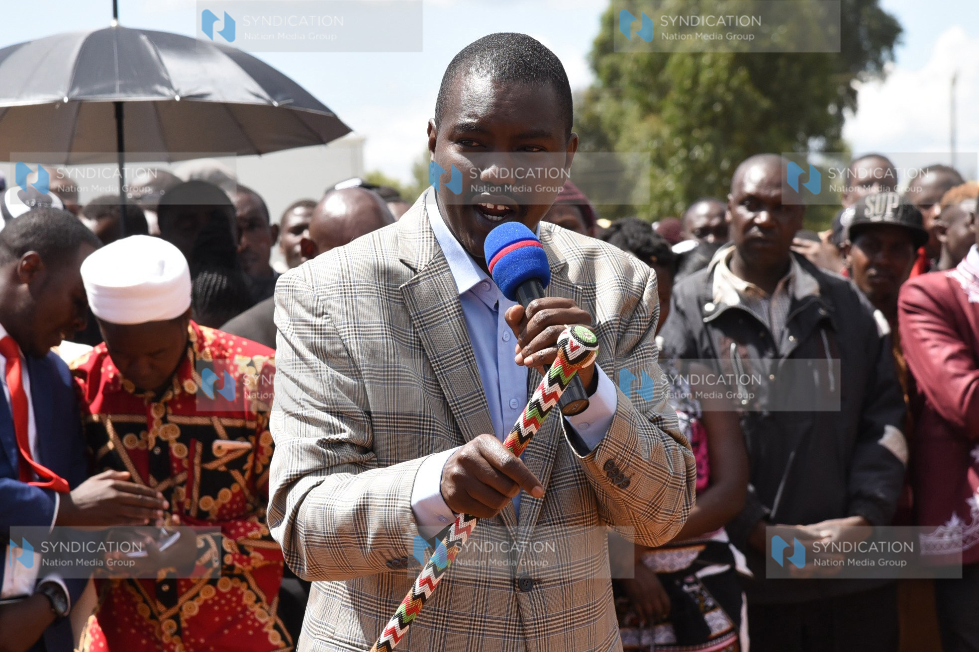 Jackson Mandago addresses mourners during a burial of the late Peter Mwaura Kungu