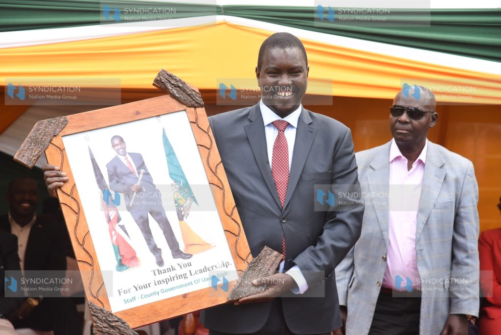 Jackson Mandago who is now the Senator-Elect for the county, displays a gift