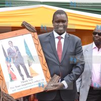 Jackson Mandago who is now the Senator-Elect for the county, displays a gift
