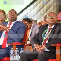 Basic Education Principal Secretary Julius Bitok and KNEC CEO David Njengere