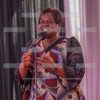 Gladys Wanga speaking to the congregation