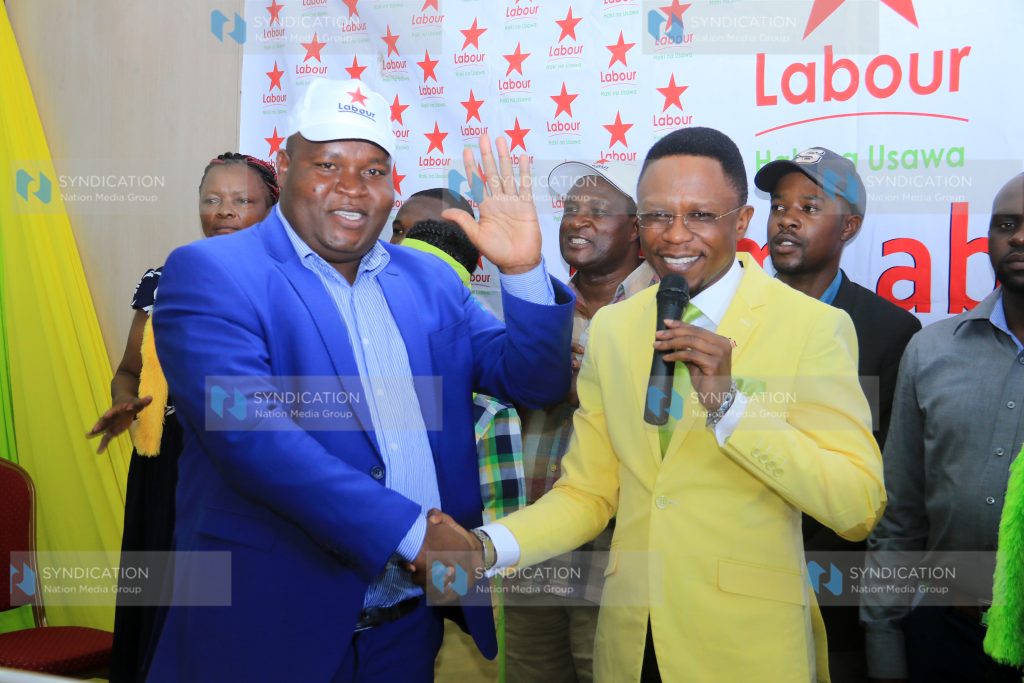 Labour Party leader Ababu Namwamba welcomes Webuye East MP aspirant Dan Simiyu to Labour Party