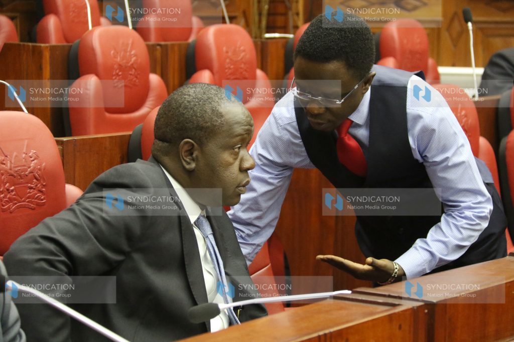 Education Cabinet Secretary Fred Matiang’i having a word with Budalangi MP Ababu Namwamba
