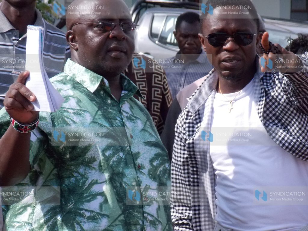 Budalangi MP Ababu Namwamba showing Vice Chancellor of Masinde Muliro University of Science and Technology Fredrick Otieno
