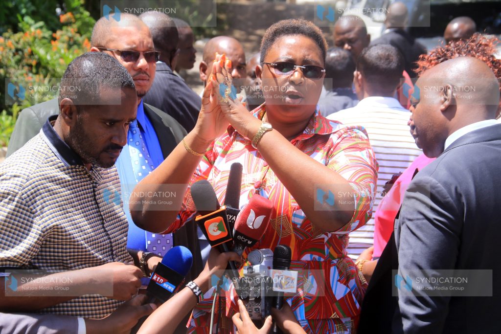 Malindi MP Aisha Jumwa and her Msamweni counterpart Suleiman Dori flanked by a section of Coast leaders