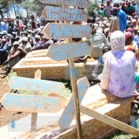 Coffins which were used for the burial of seven bodies of people from one family who were killed during post-election violence