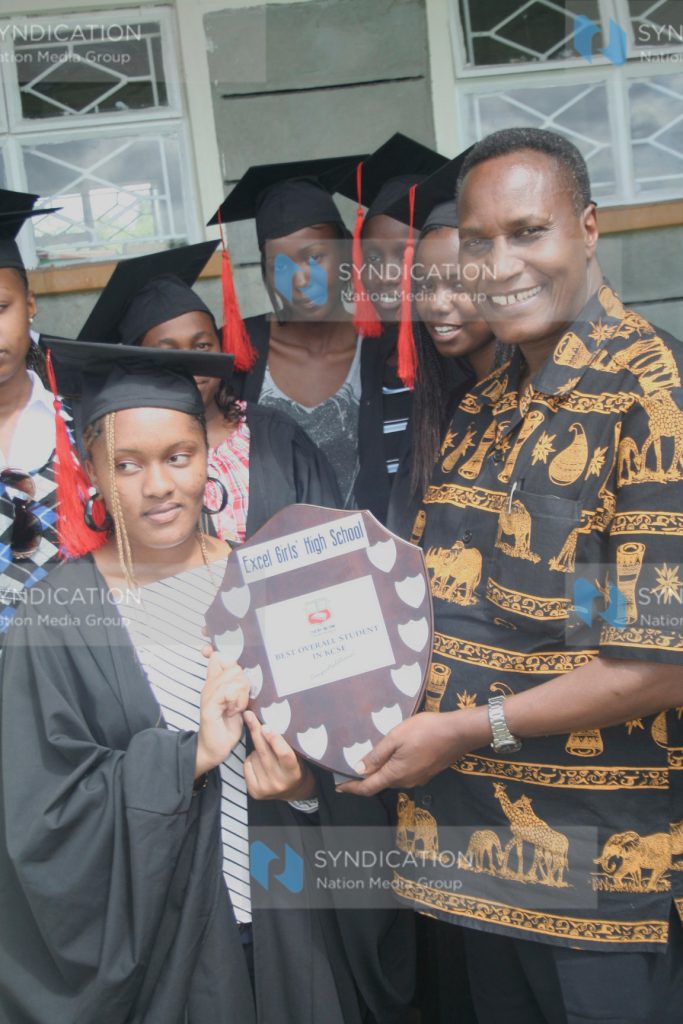 Nancy Njeri with Deputy Vice -Chancellor Academic affairs Prof Jacob Kaimenyi of Nairobi University