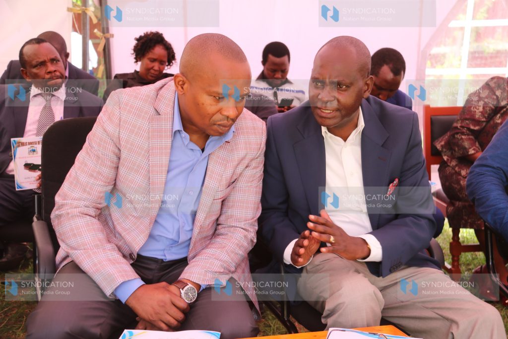 Senate Deputy Speaker Kithure Kindiki chats with Mbeere North MP Muriuki Njagagua