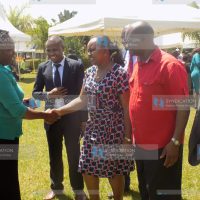 Anne Waiguru, Kirinyaga County Governor, greets a Jubilee supporter