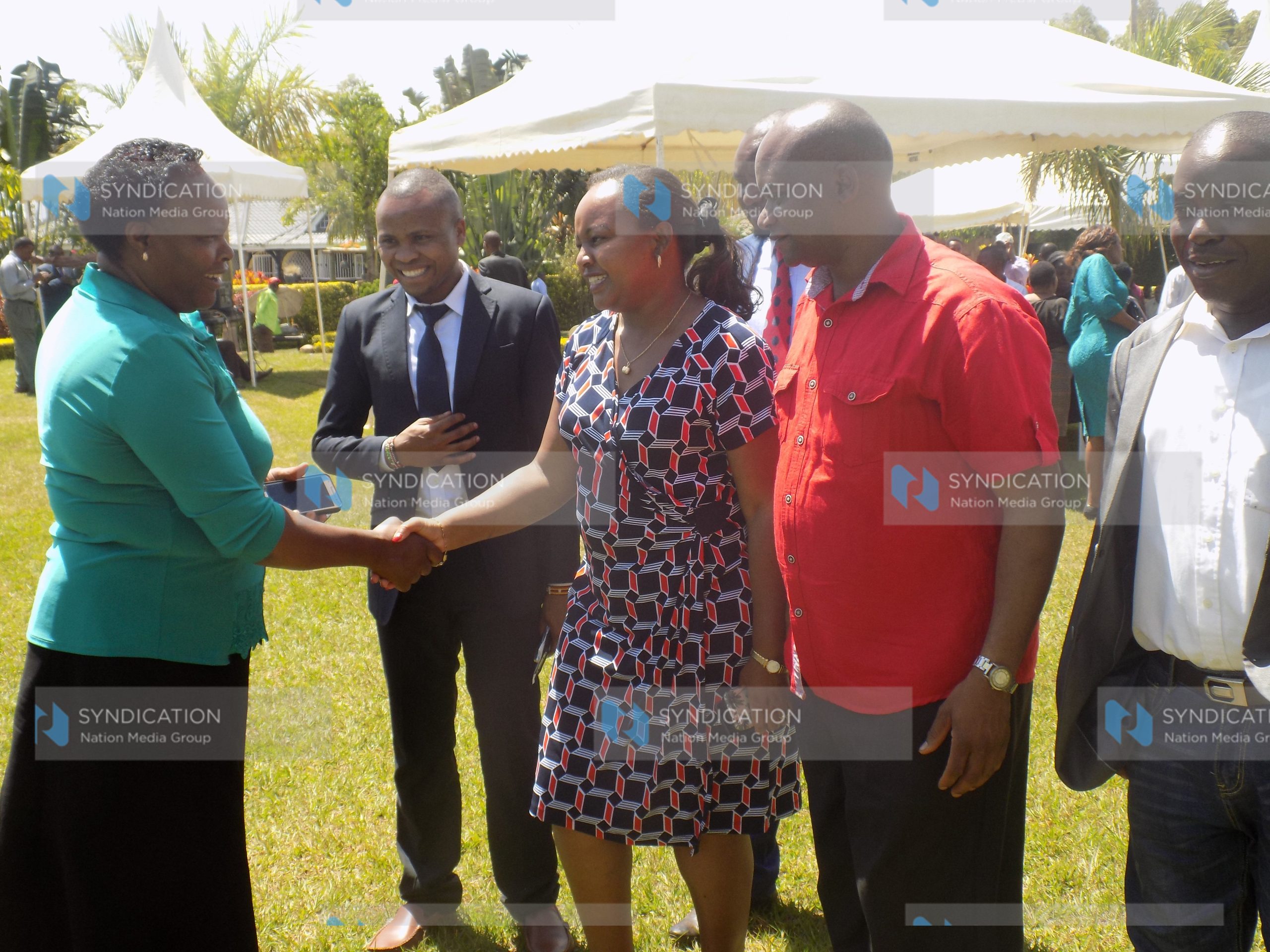 Anne Waiguru, Kirinyaga County Governor, greets a Jubilee supporter