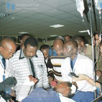 Sabatia MP who is also a member of ODM leadership Mr. Musalia Mudavadi consoling a victim of post-election violence