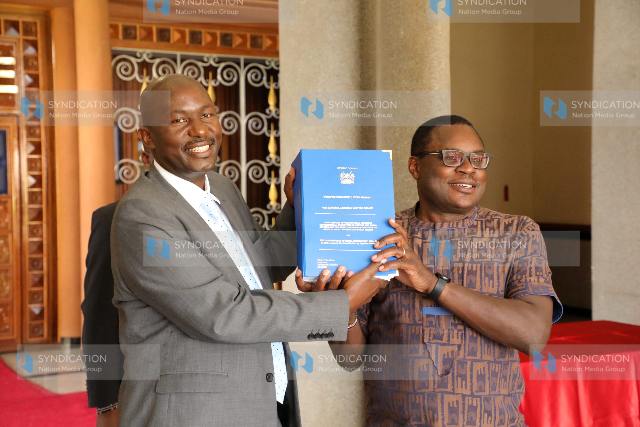 Speaker of the Senate Kenneth Lusaka (right) receives BBI report