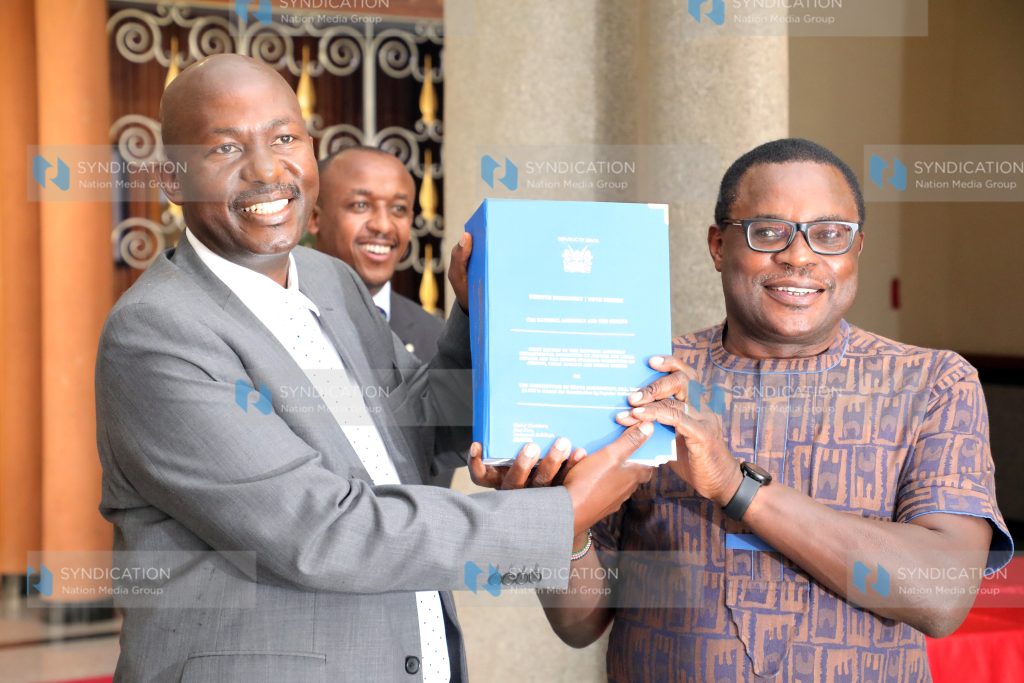 Speaker of the Senate Kenneth Lusaka (right) receives BBI report