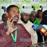 Haki Africa Executive Director Hussein Khalid (left) with other Human Rights officers addresses the press