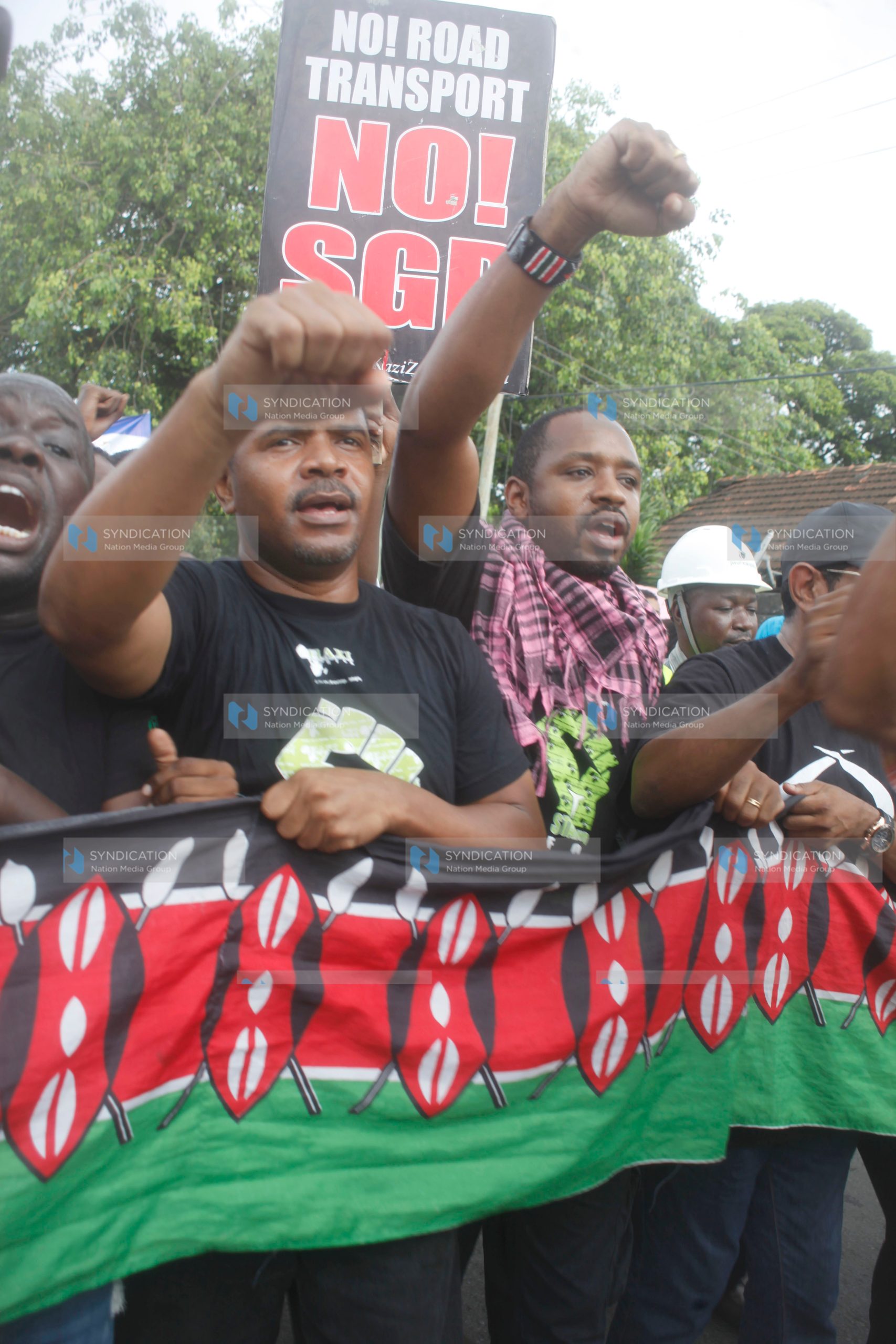 Activists Khalid Hussein and Boniface Mwangi join anti-SGR protesters along Abdelnasser road