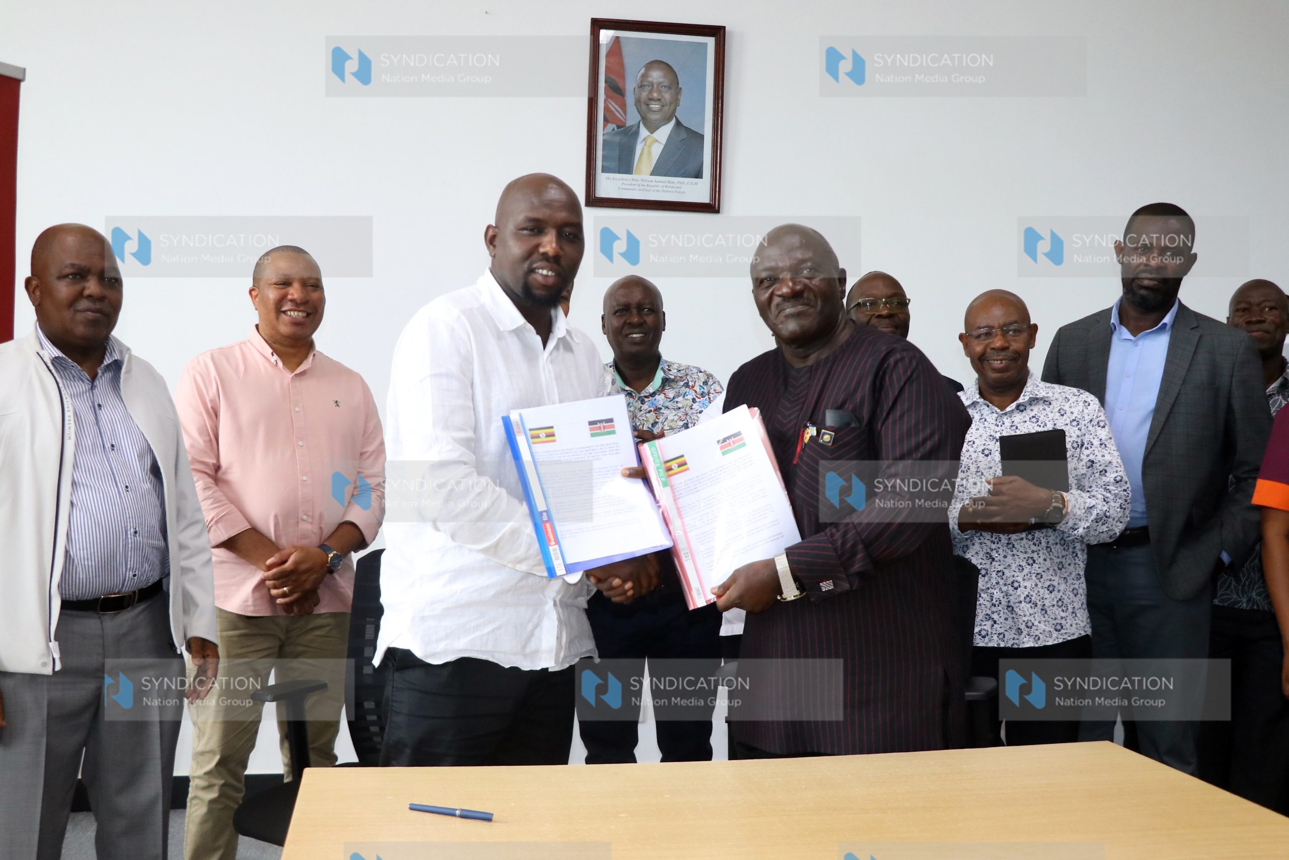 Transport Cabinet Secretary Kipchumba Murkomen and Uganda’s Works and Transport Minister Gen Edward Katumba-Wamala
