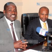 Meru County Governor and Council of Governors Chairman Peter Munya, flanked by Gulf Energy Chief Executive Officer Francis Njog