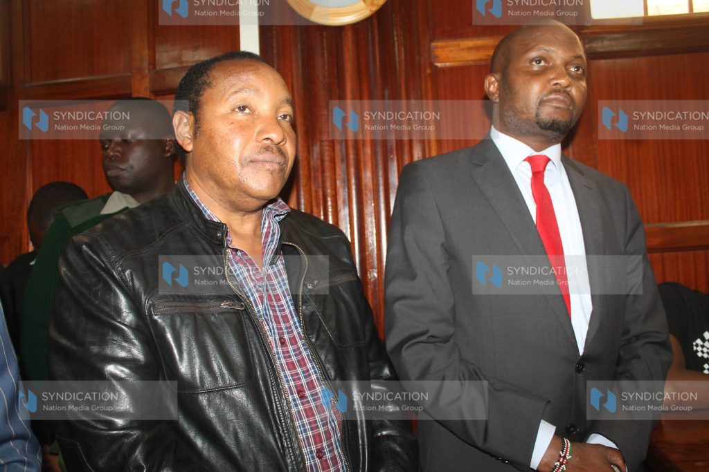 Kabete MP Ferdinand Waititu with his Gatundu South counterpart Moses Kuria in a Nairobi court