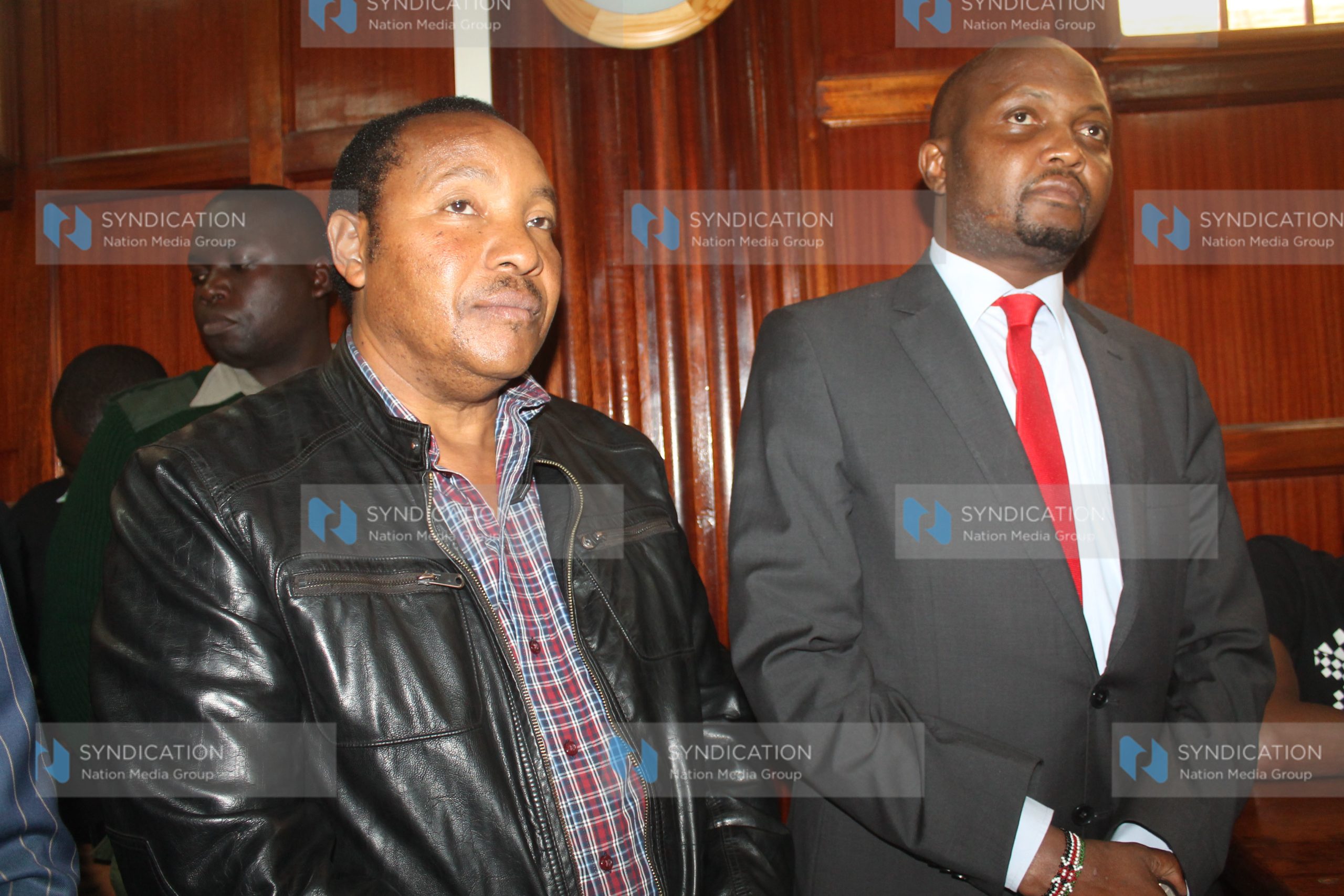 Kabete MP Ferdinand Waititu with his Gatundu South counterpart Moses Kuria in a Nairobi court