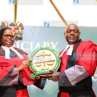 Chief Justice Martha Koome presents instruments of power to Justice Oscar Angote