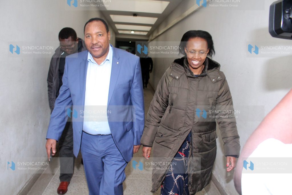 Ferdinand Ndungu Waititu and his wife Susan Wangari Ndung’u are taken to police cells at Milimani Law Courts