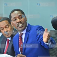 Peter Munya (right) and Co-operative PS Ali Noor Ismail during a media briefing