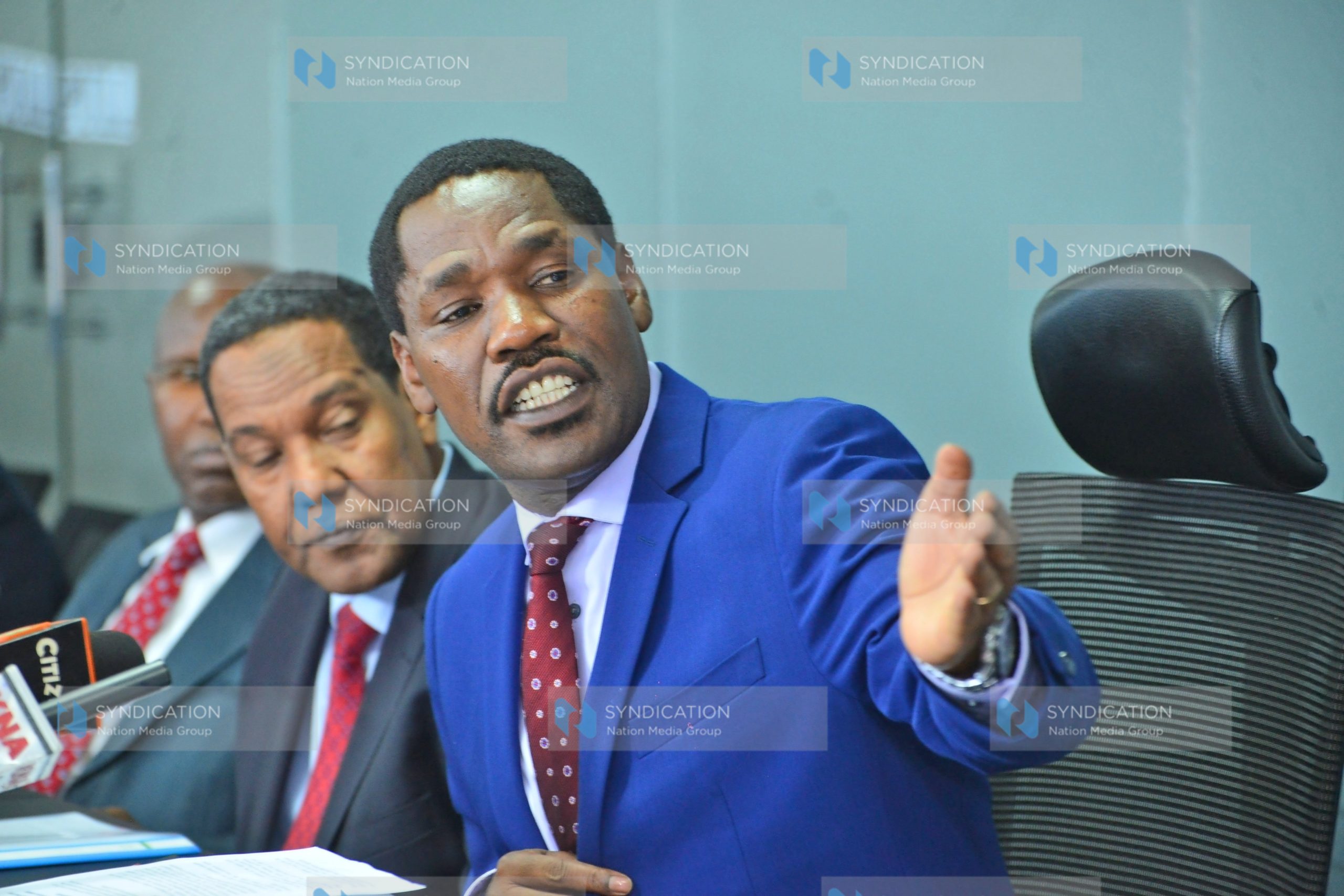 Peter Munya (right) and Co-operative PS Ali Noor Ismail during a media briefing