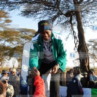 Speaker of Parliament Justin Muturi greets marathoners