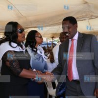 Meru Governor Peter Munya (right) consoles Kate Maore