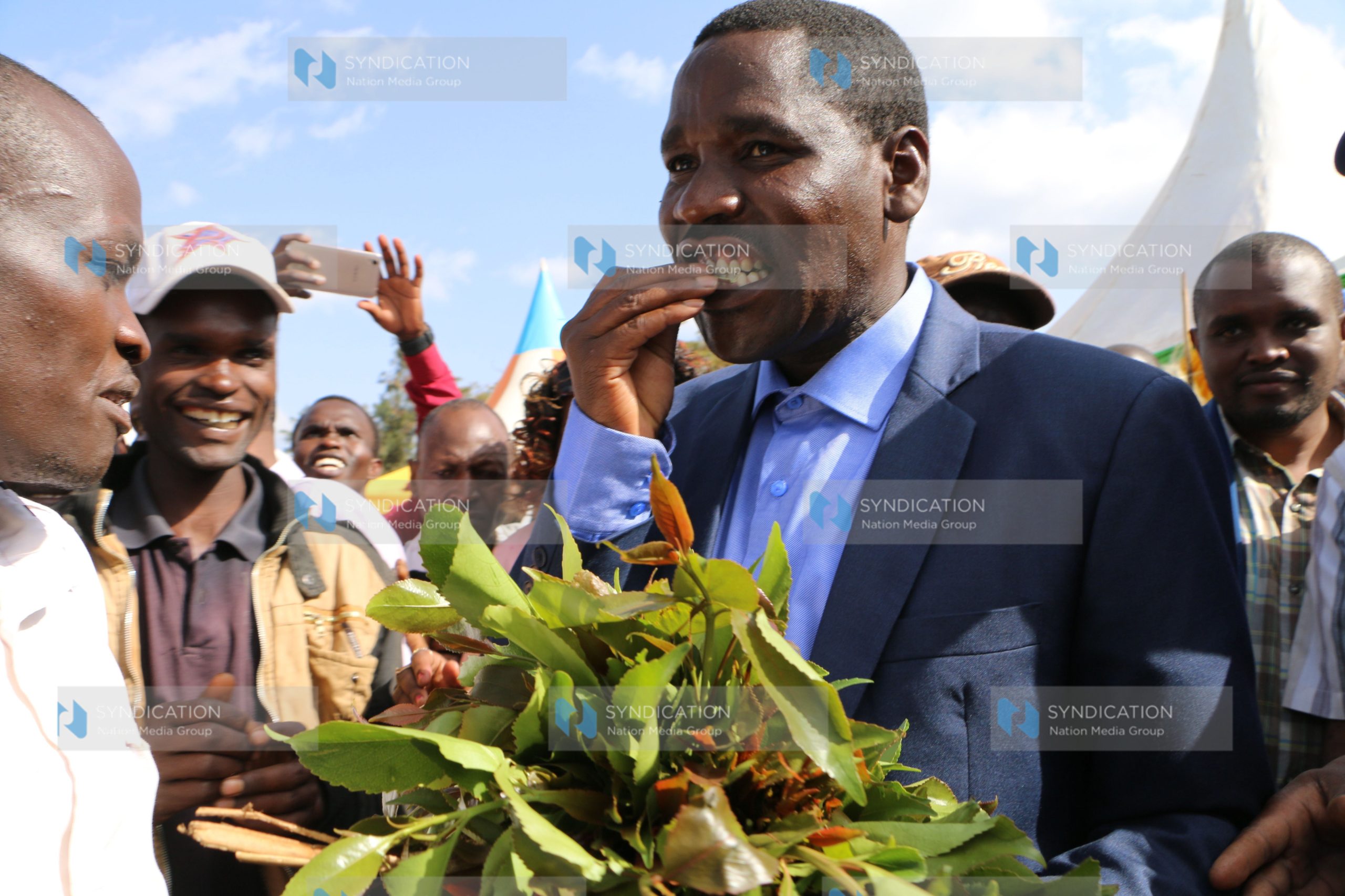 Meru Governor Peter Munya shares miraa with residents