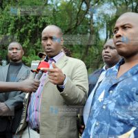 Nakuru Town MP Lee Kinyanjui, flanked by municipal councilors, addresses journalists