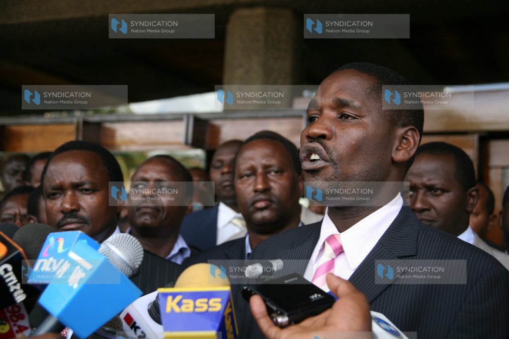 Peter Munya address a media briefing after a Parliamentary Group meeting