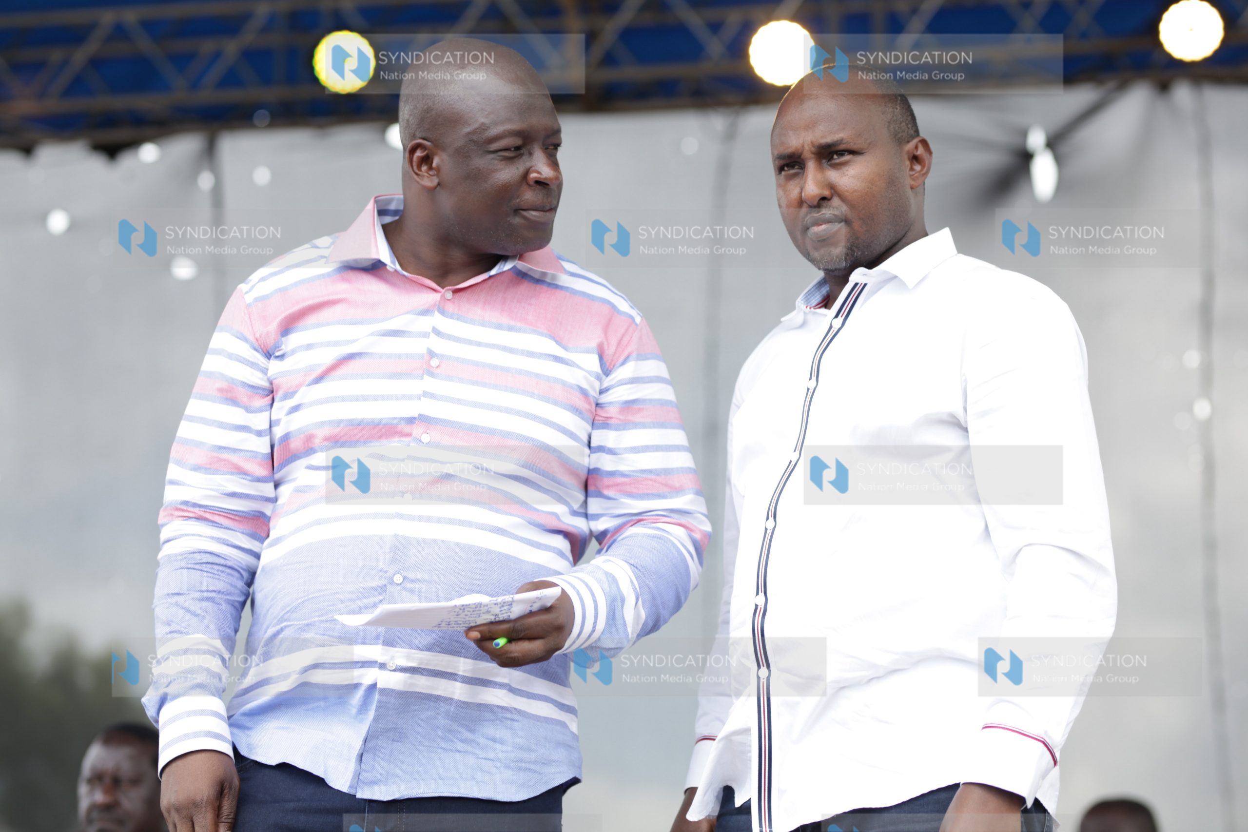 Nyatike MP Tom Odege chats with Suna East MP Junet Mohamed