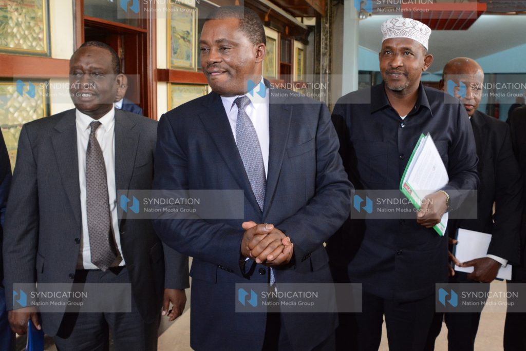 Justin Muturi [C] and Leader of Majority in the National Assembly Aden Duale [2nd R] at Parliament Buildings