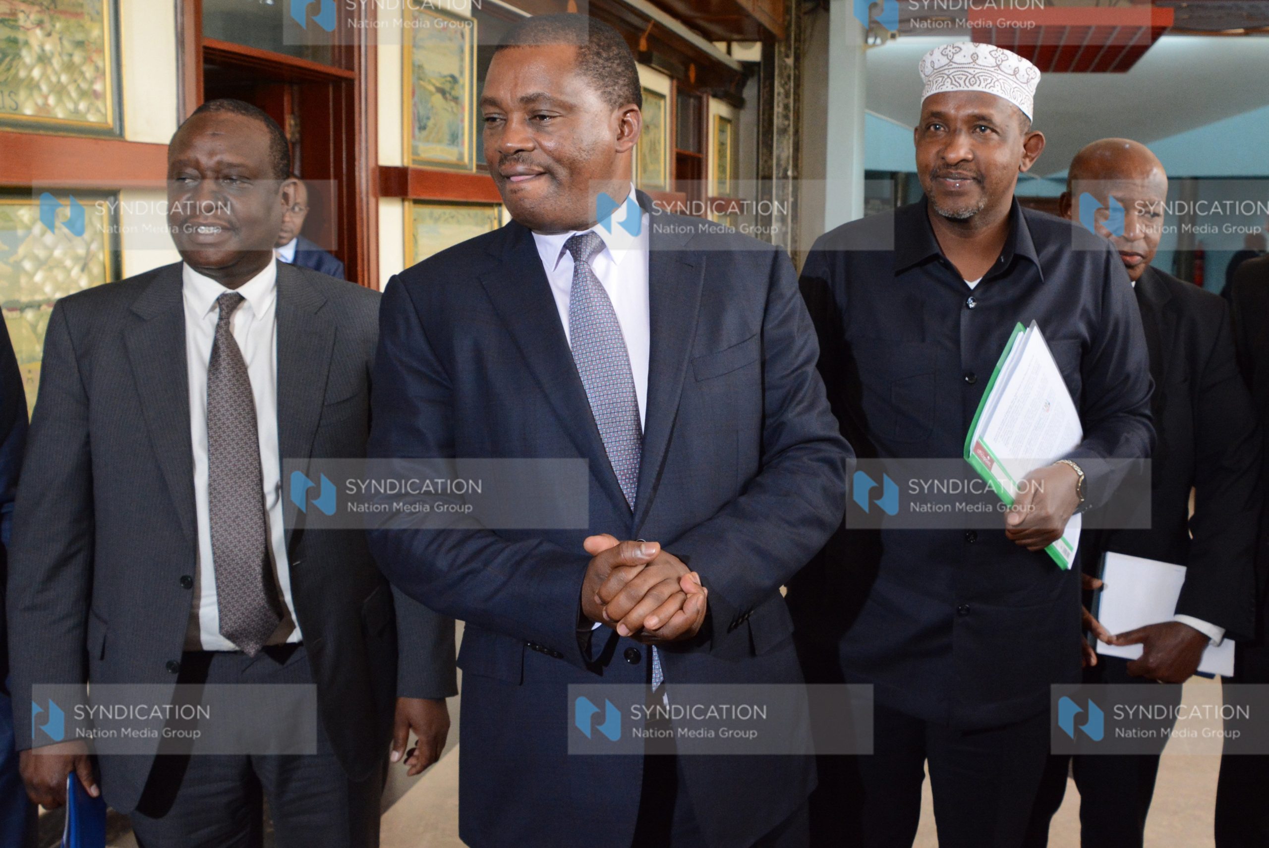 Justin Muturi [C] and Leader of Majority in the National Assembly Aden Duale [2nd R] at Parliament Buildings