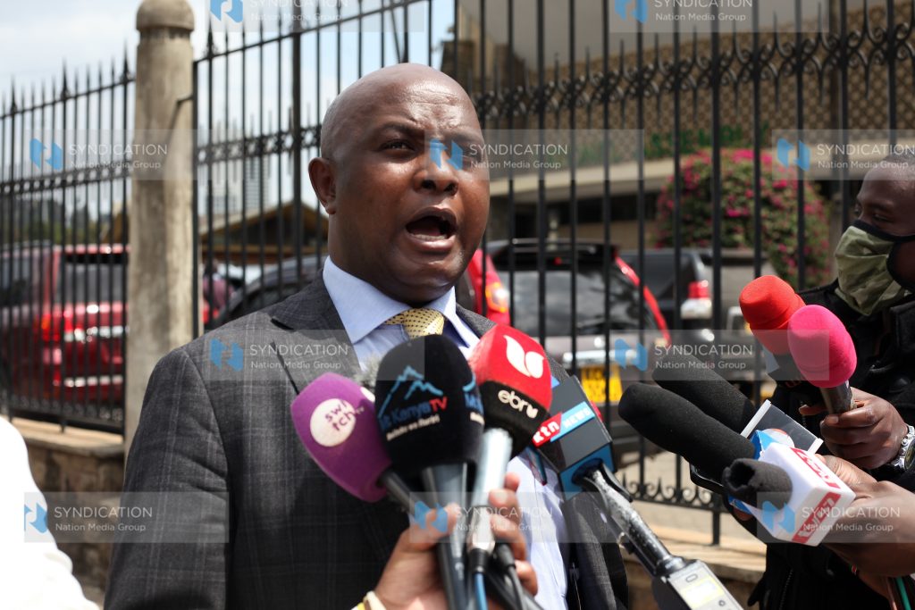 Godfrey Osotsi addressing the press at parliament buildings