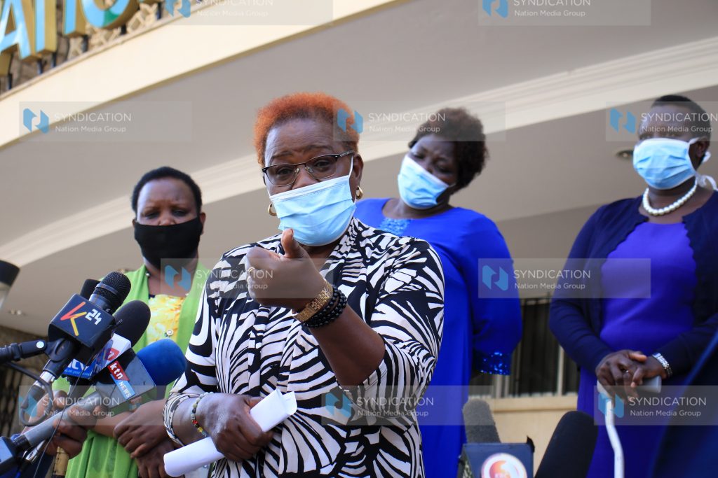Kandara MP Alice Wahome [C], flanked by other Inua Mama and Jenga Jamii women political caucus MPs, addresses the media