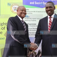Genaro Guantai is congratulated by Meru County Governor Peter Munya