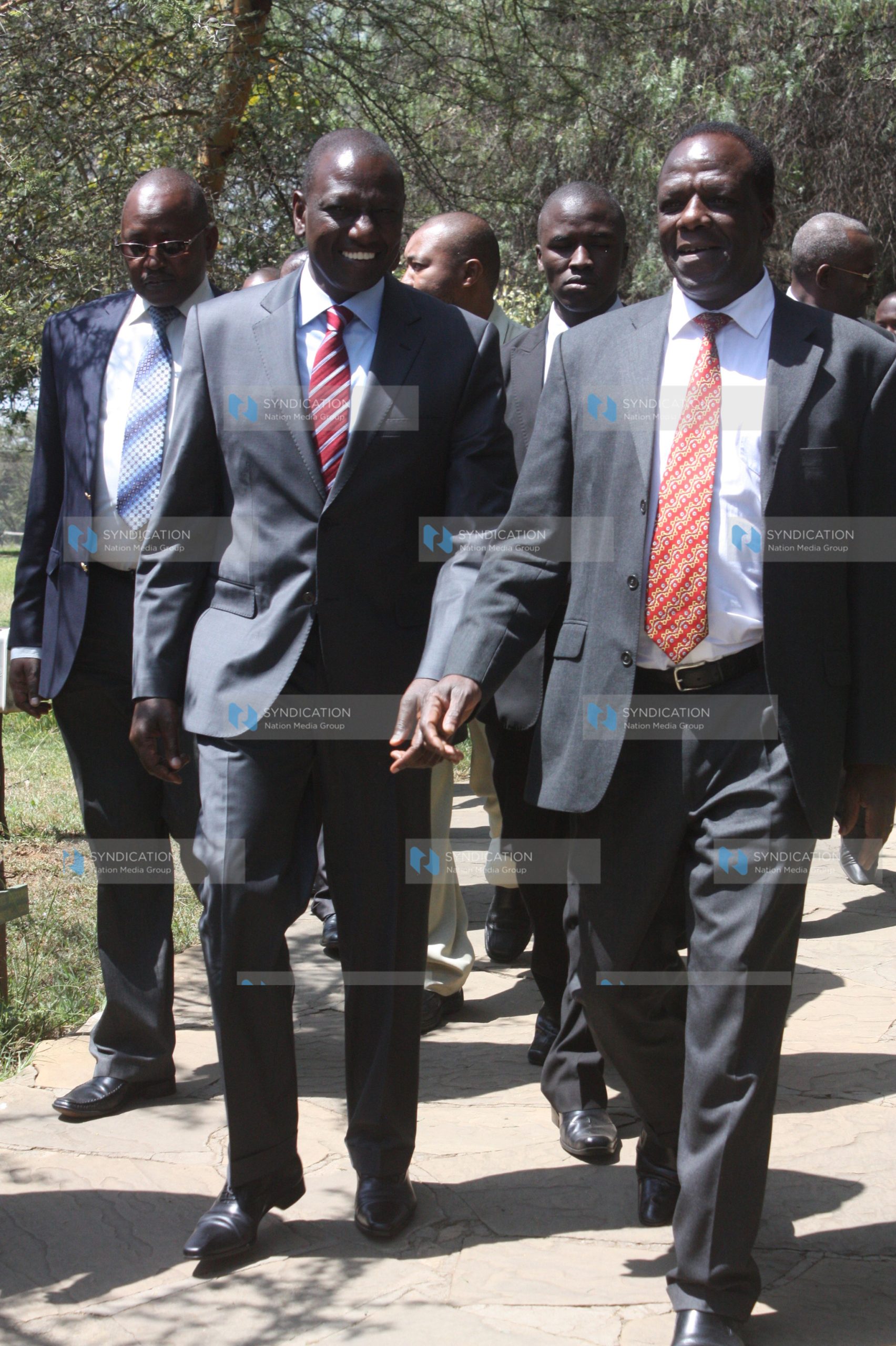 Deputy President William Ruto (left), accompanied by Governor Wycliffe Oparanya, arrives at the Great Rift Valley Lodge