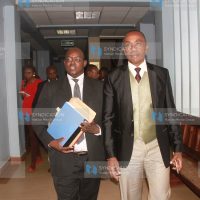 Kiambu Senator Paul Kimani Wamatangi and his lawyer Kibe Mungai leaving cour