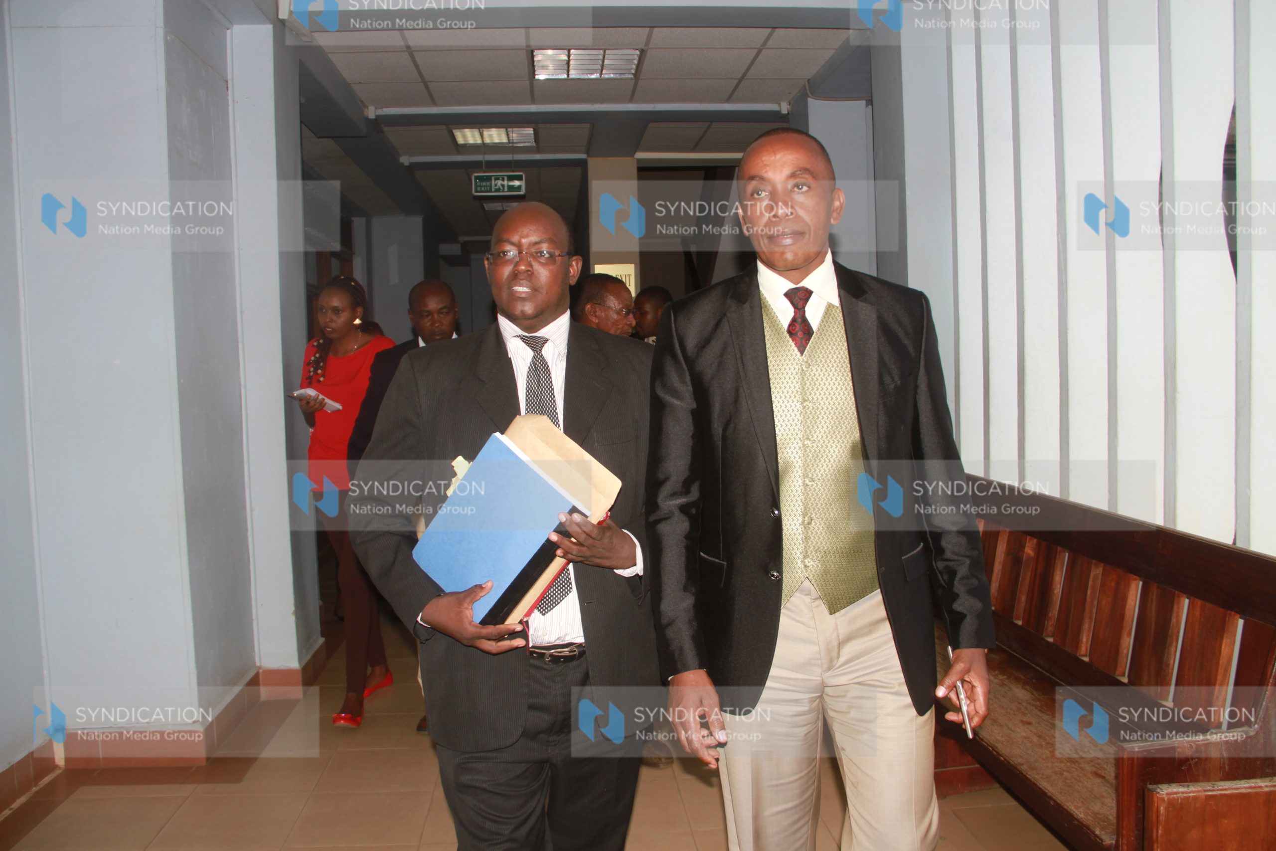 Kiambu Senator Paul Kimani Wamatangi and his lawyer Kibe Mungai leaving cour