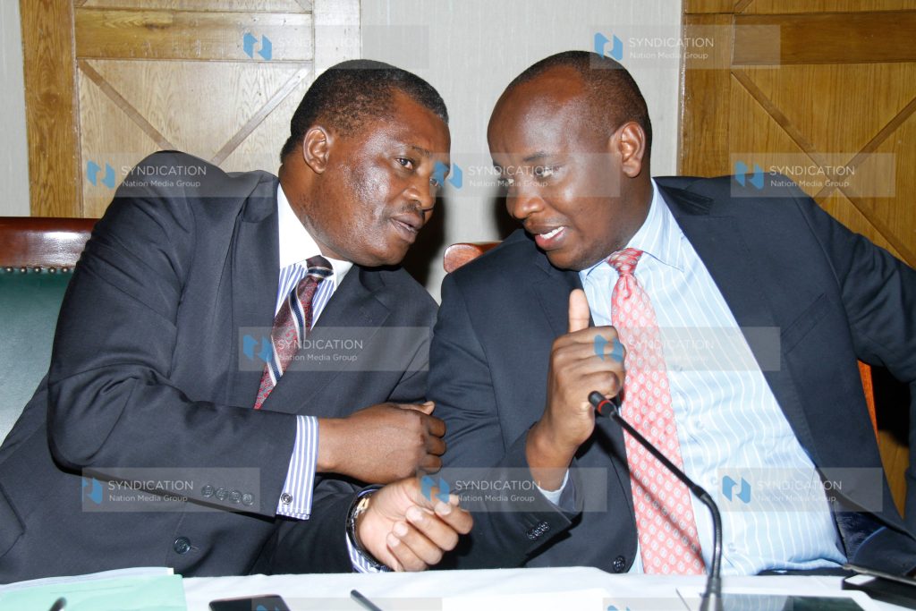 Speaker of the National Assembly Justin Muturi confers with Kenya Editors Guild chairman Linus Kaikai