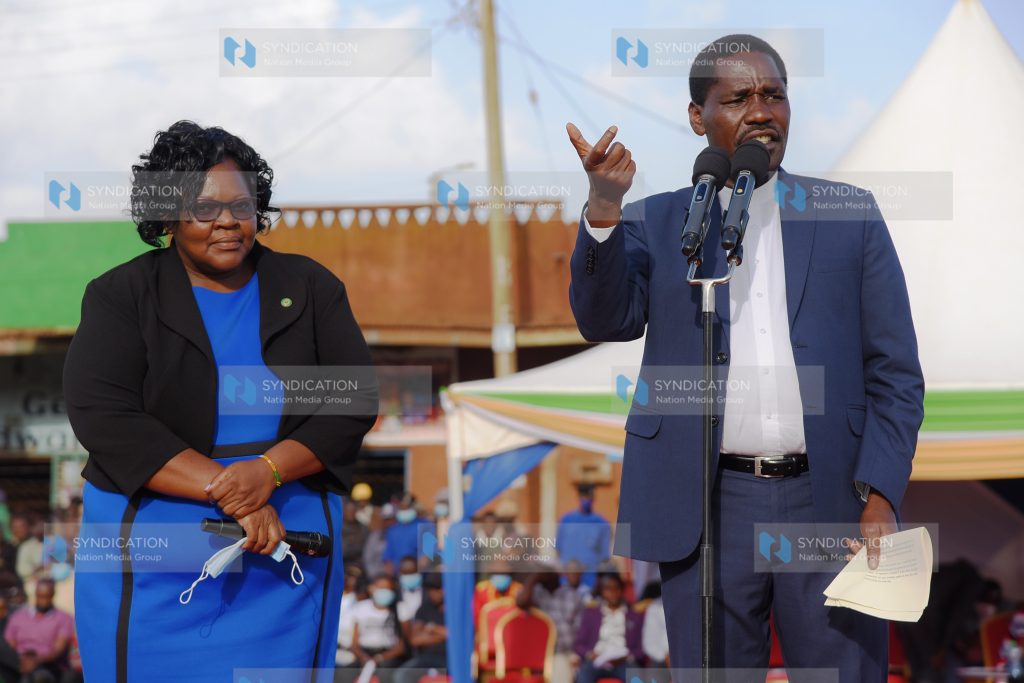 Agriculture Cabinet Secretary Peter Munya (right) addresses potato farmers