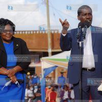 Agriculture Cabinet Secretary Peter Munya (right) addresses potato farmers