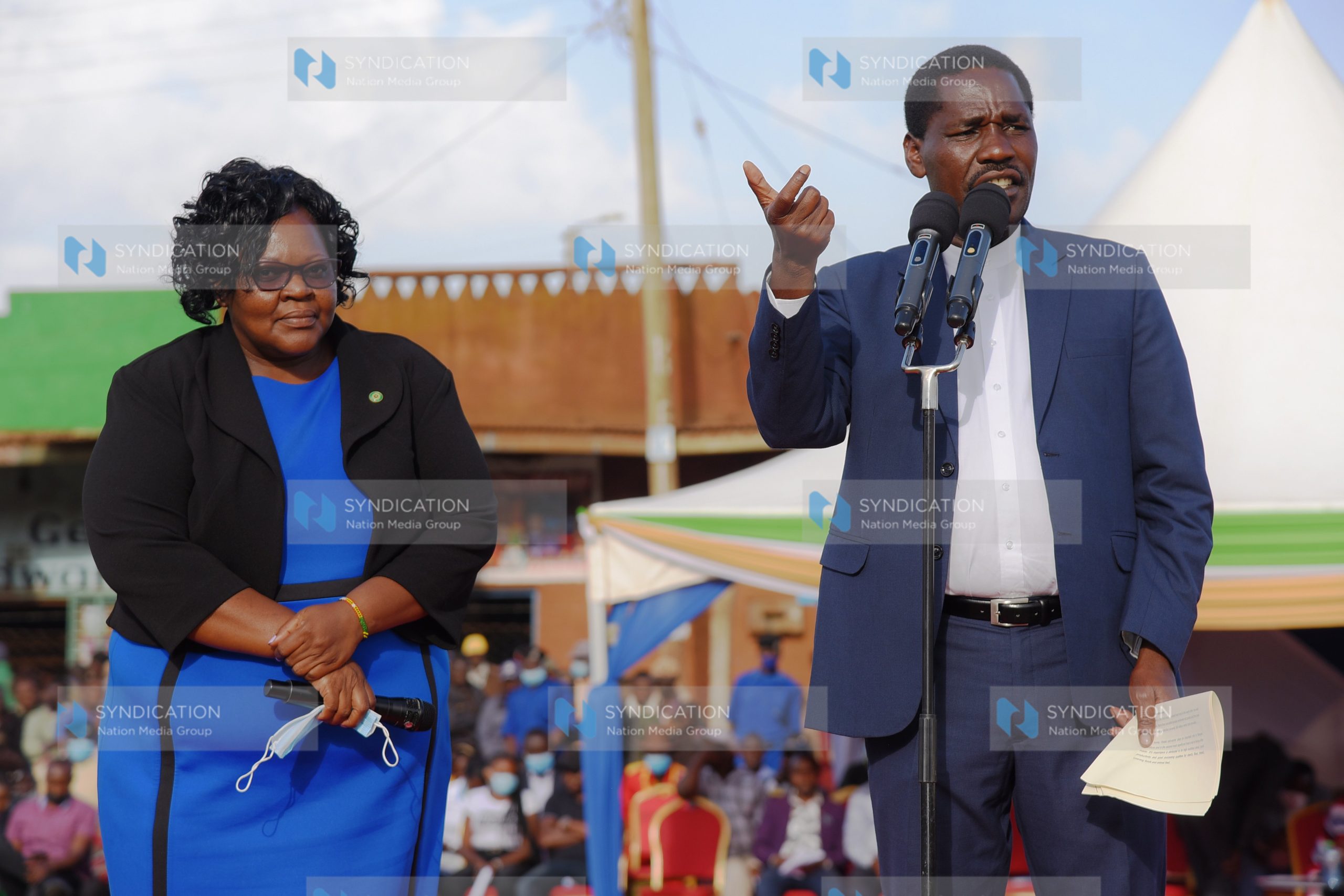 Agriculture Cabinet Secretary Peter Munya (right) addresses potato farmers