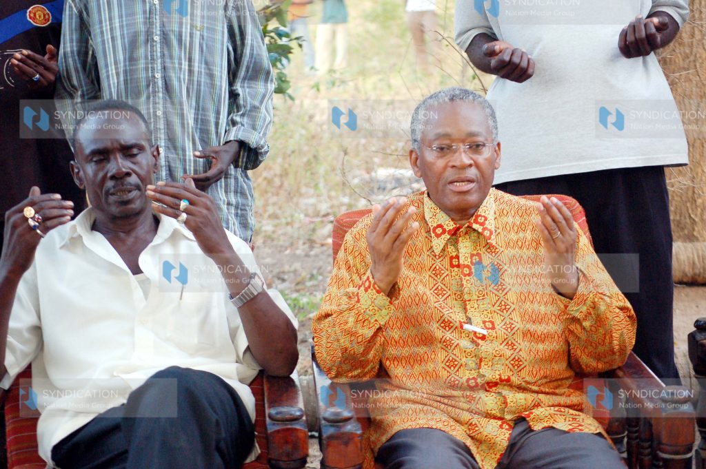 Mr. Omar Mwamnuadzi in prayers