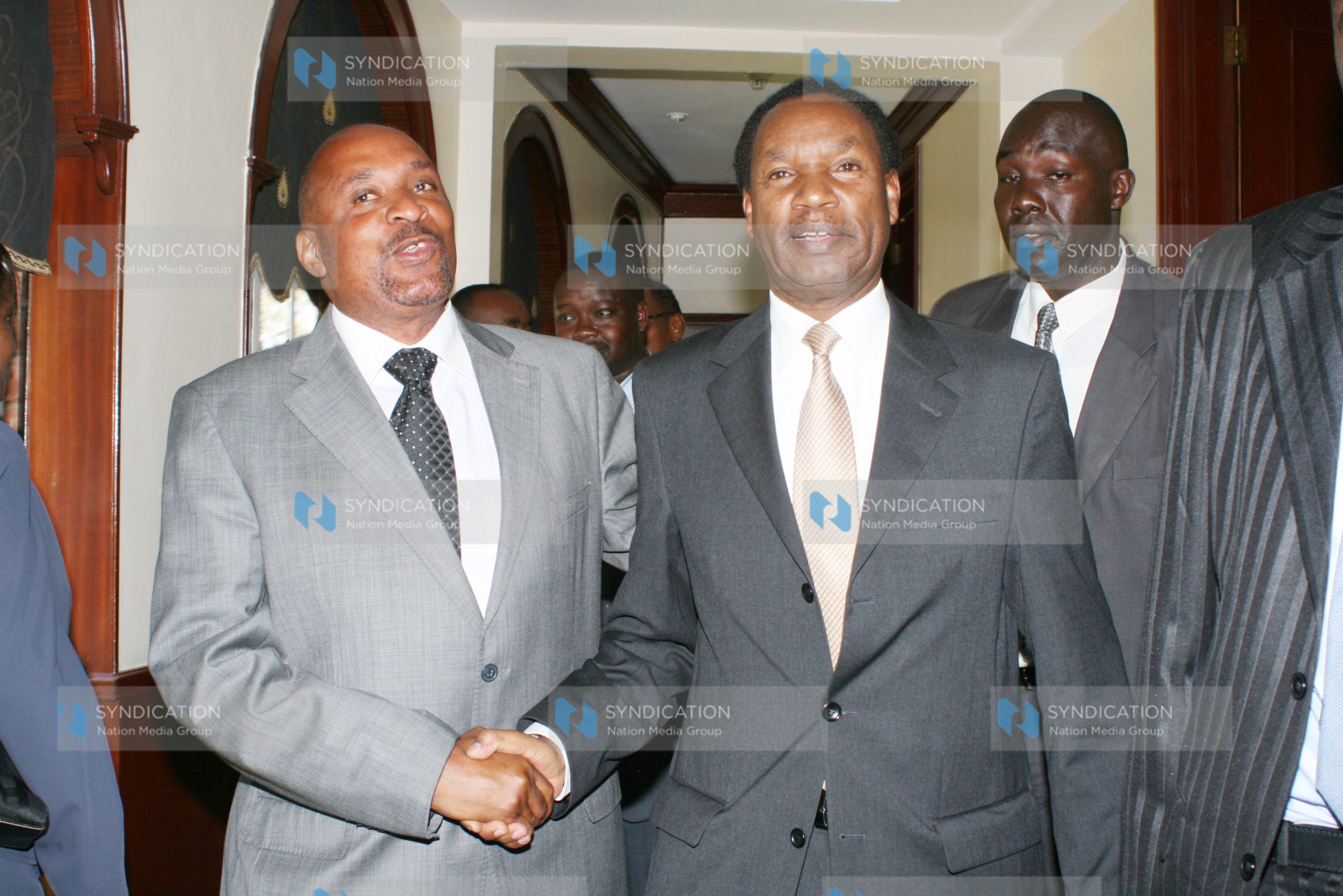 The Minister for Trade Henry Kosgey (right) with Member of Parliament Dan Mwazo after a press conference